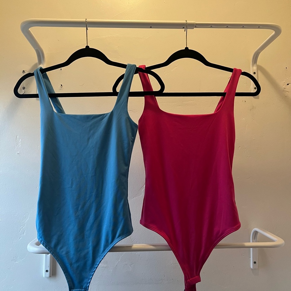 Women’s One-Piece Bodysuits — Blue and Pink